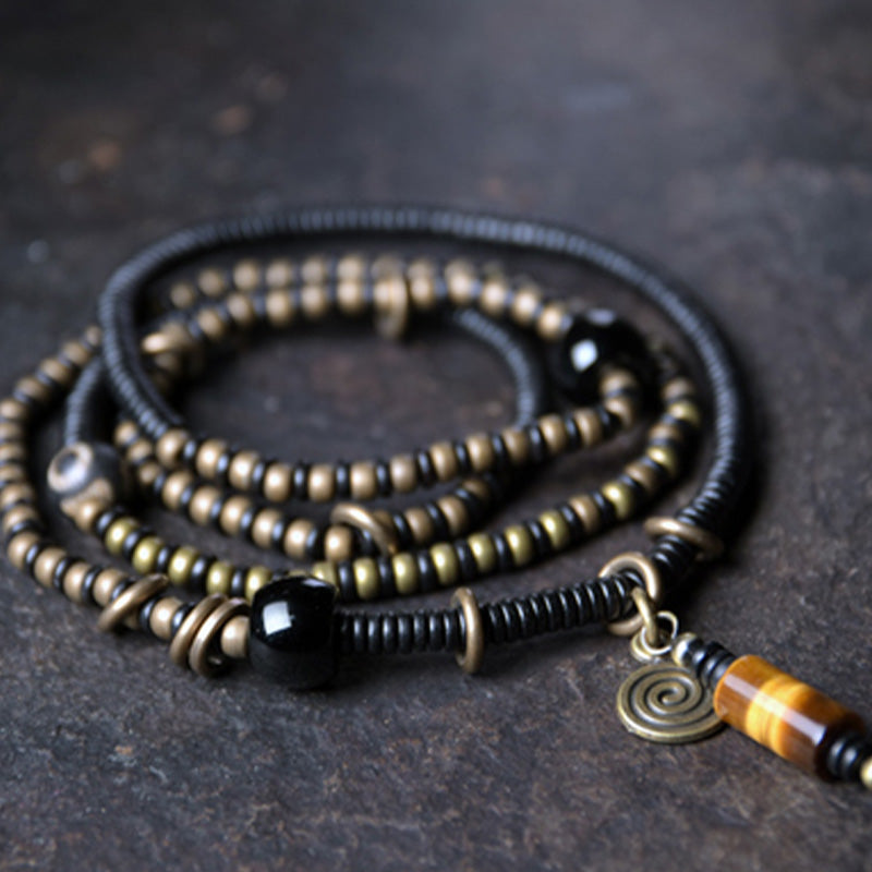Armband Kupfer Ebenholz Paar mit Spirale Anhänger elegant.