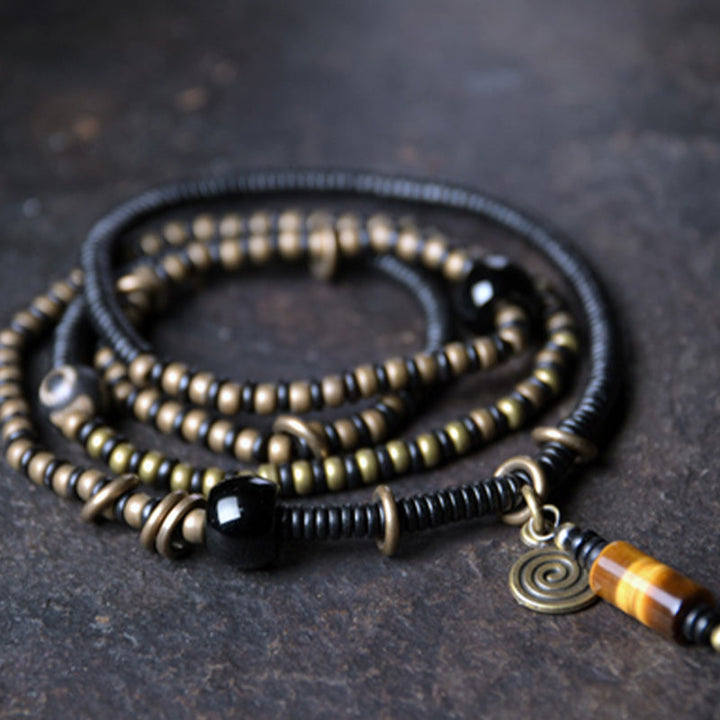 Armband Kupfer Ebenholz Paar mit Spirale Anhänger elegant.