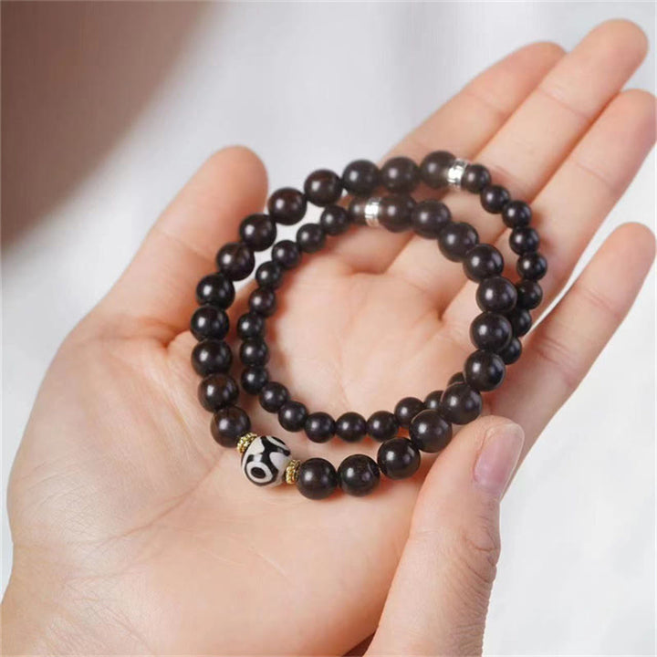 Armband Ebenholz Dzi – Balance & Schutz