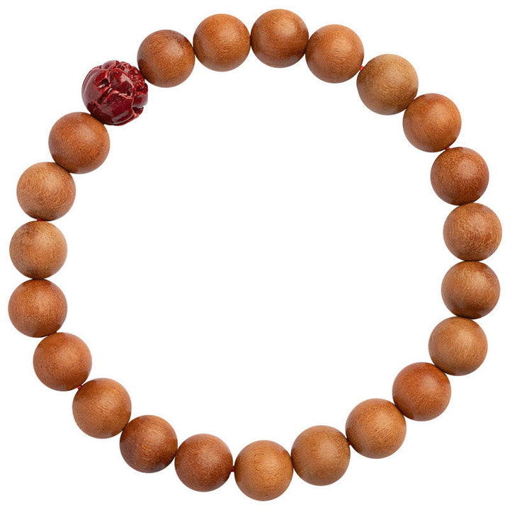 Armband Zinnober Lotus – Glück & Wohlstand mit braunen Holzperlen und rotem Akzent.
