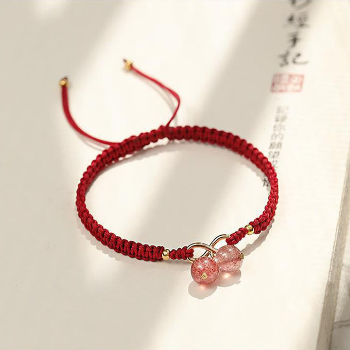 Rotes Armband Erdbeerquarz mit goldenen Perlen elastisch