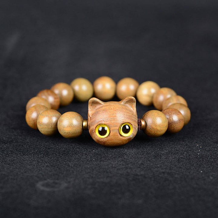 Sandelholz Katzen Armband mit gelben Augen elastisch Perlen