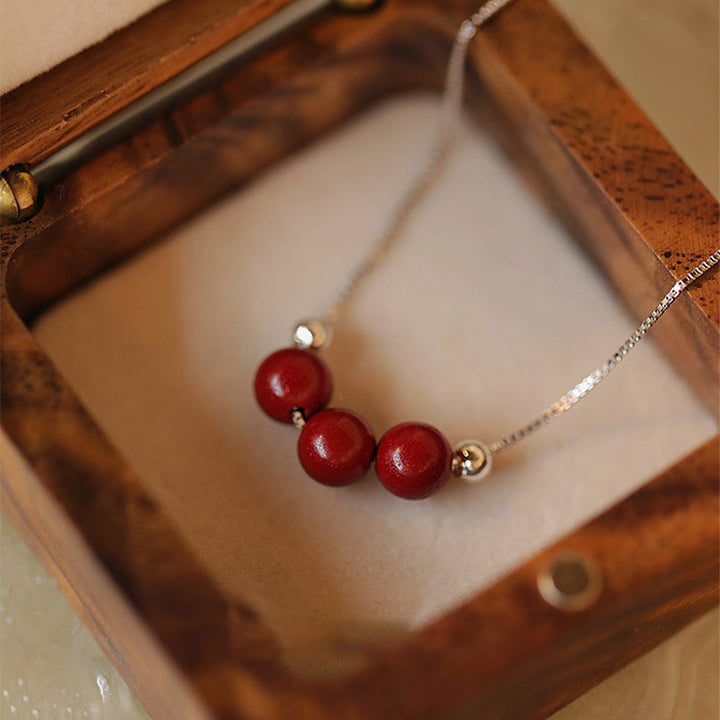 Zinnober Anhänger Sterlingsilber Kette rot Perlen