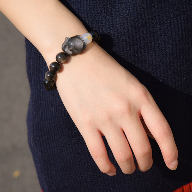 Obsidian Fuchs Armband Silber Heilung Naturstein elastisch Handgelenk getragen