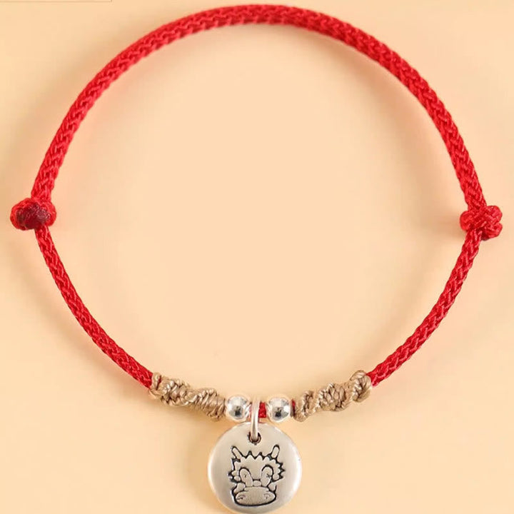 Rotes Armband mit Silber Tierkreis Anhänger elastisch Glück Harmonie
