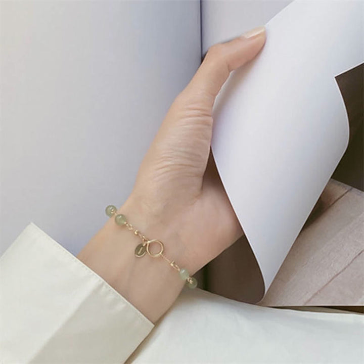 Jade Armband Glück grüne Perlen goldene Verschluss Handgelenk elegant