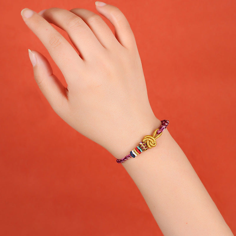 Buntes geflochtenes Armband Dunhuang Schutz am Handgelenk getragen