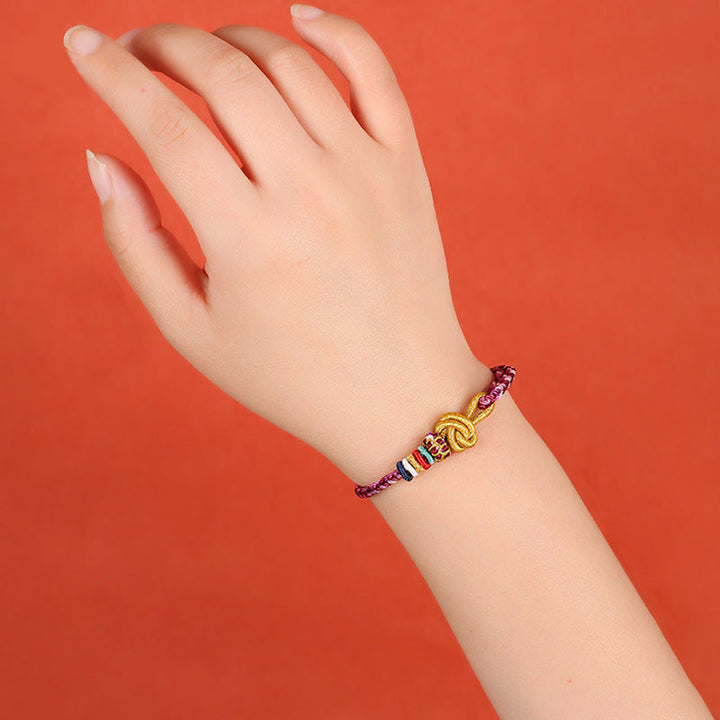 Buntes geflochtenes Armband Dunhuang Schutz am Handgelenk getragen