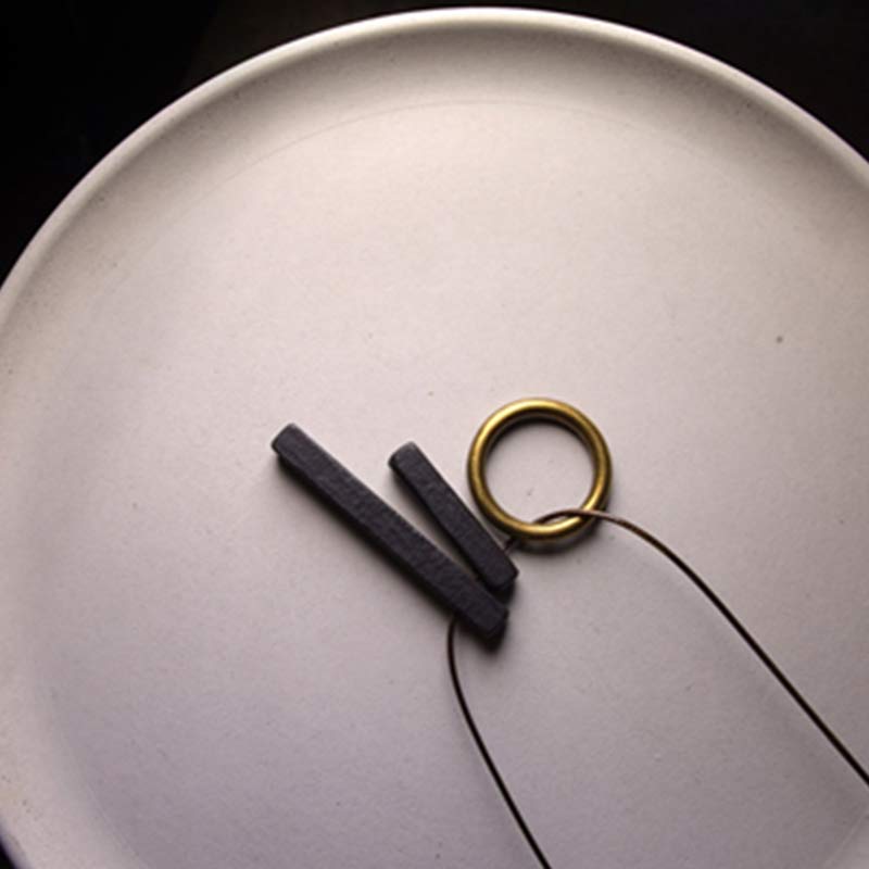 Anhänger Ebenholz Zen Kreis minimalistisches Design schwarzer Stein