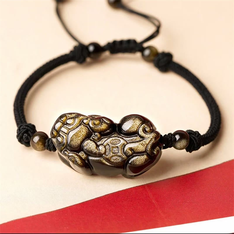 Obsidian Pixiu Armband mit goldenem Muster schwarzes elastisches Band getragen