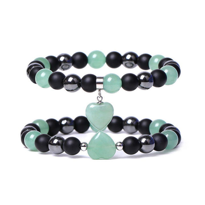 Armband Schwarzer Onyx Tigerauge mit grünem Aventurin Herzanhänger elegant.