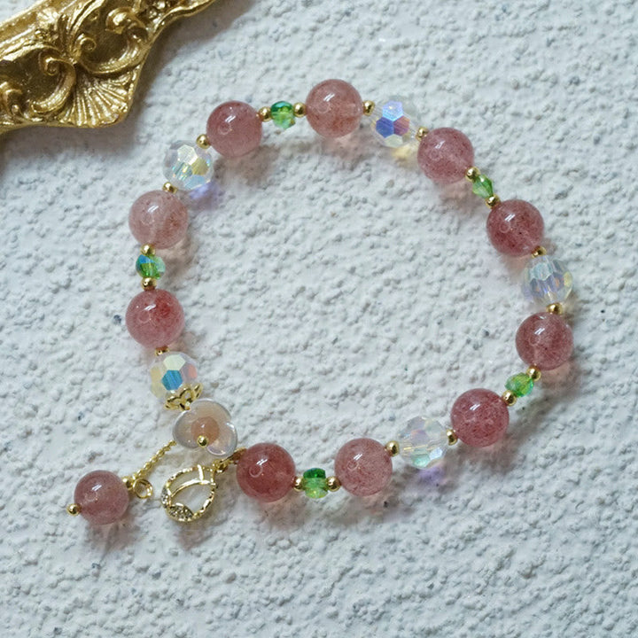 Armband Erdbeerquarz Fluorit – Heilung rosé Perlen grün facettiert gold