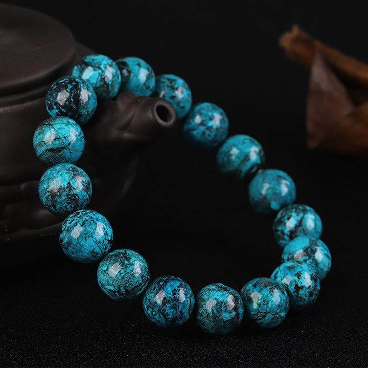 Türkis Phönix Armband Stärke Mut elastisch Naturstein blau strukturiert