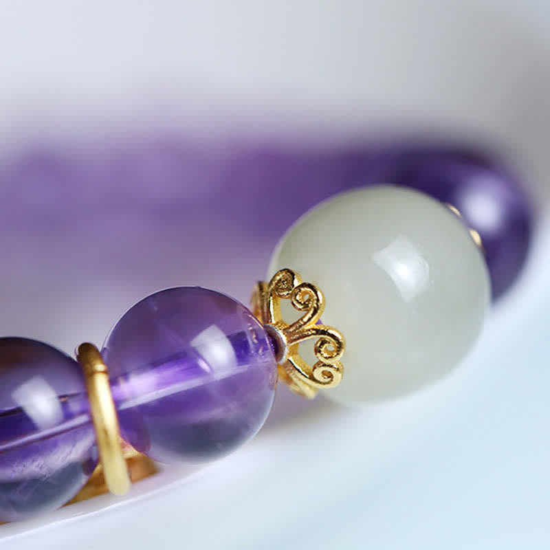 Armband Amethyst Kristall Heilung Harmonie lila weiß Perlen vergoldet
