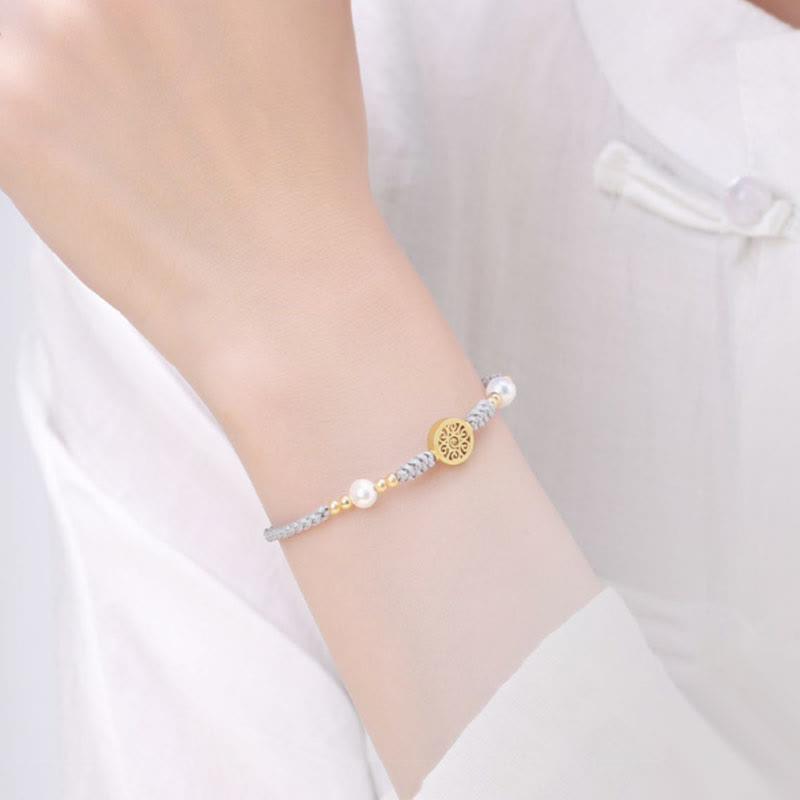 Armband Kupfer Perle – Glück mit grauem Perlenarmband elegant getragen