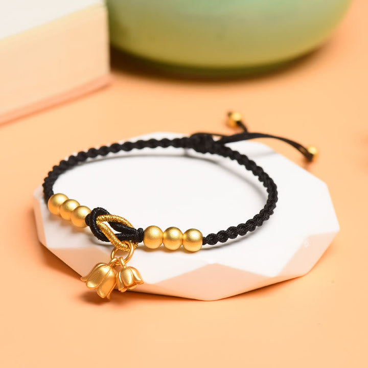 Armband – Schutz & Glück Segen schwarze Kordel goldene Perlen Anhänger