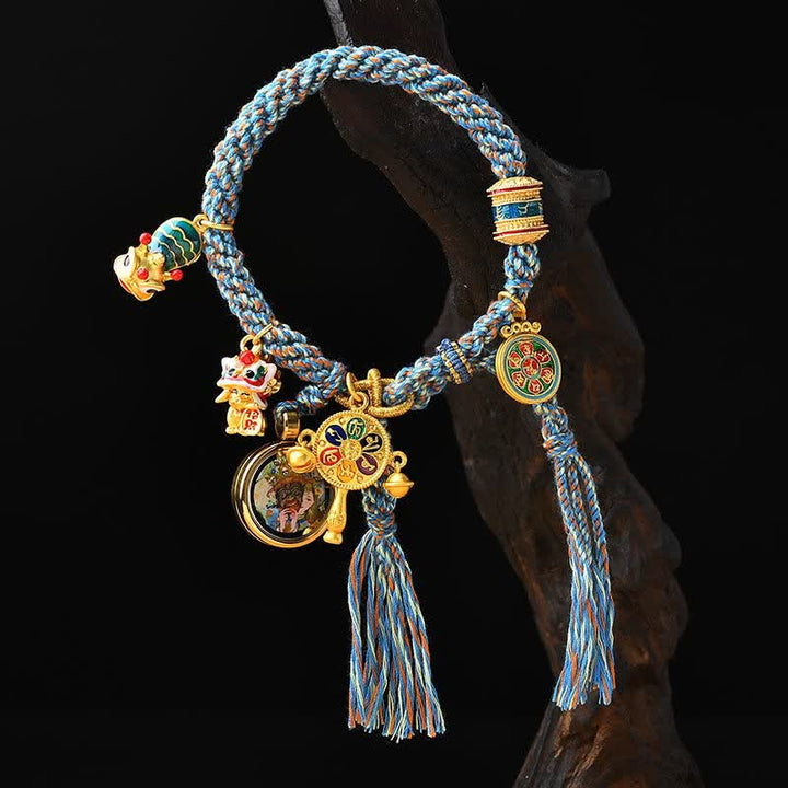 Armband – Glück & Wohlstand mit goldenen Anhängern blauem Seil elegant.