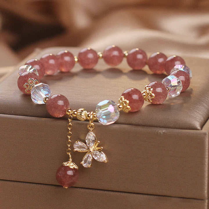 Armband Erdbeerquarz Schmetterling rosa Perlen gold elastisch elegant.