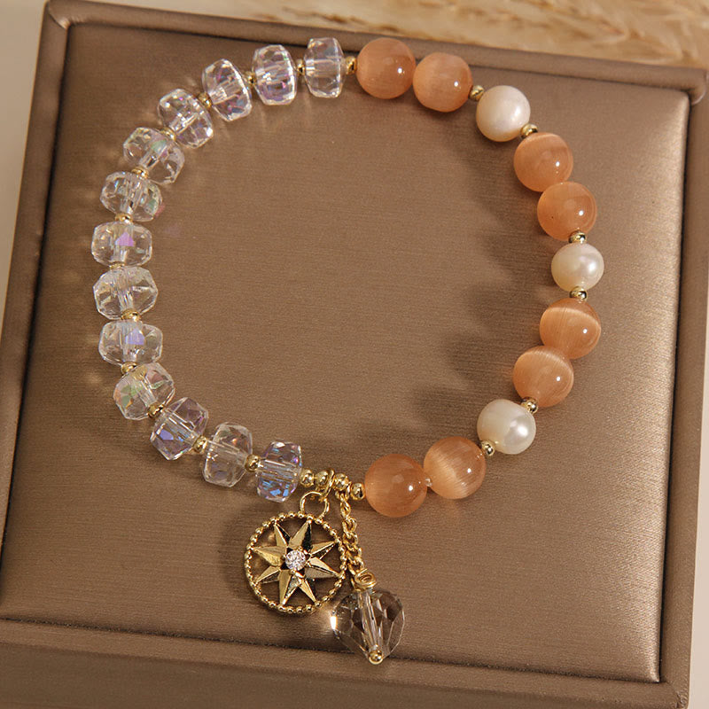 Armband Weißer Kristall Stern mit Perlmutt und Rosenquarz Perlen.