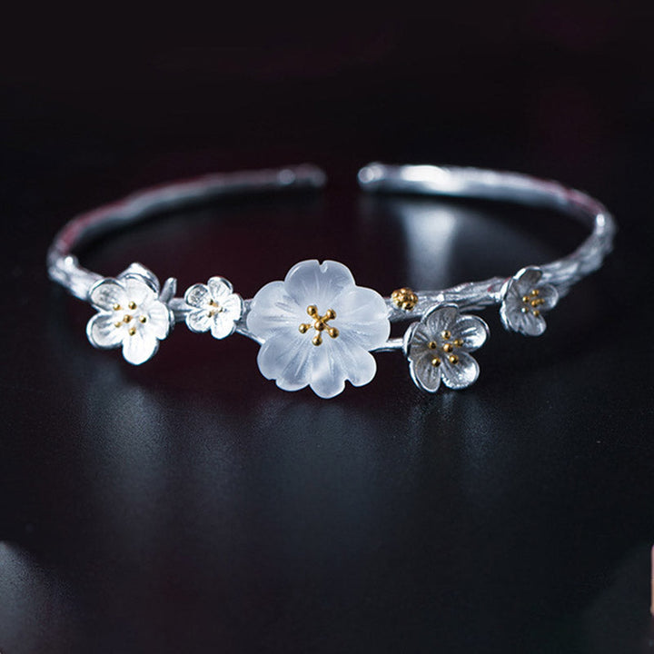 Armband 925 Silber – Segen Balance mit zarten Blütenanhängern elegant am Handgelenk