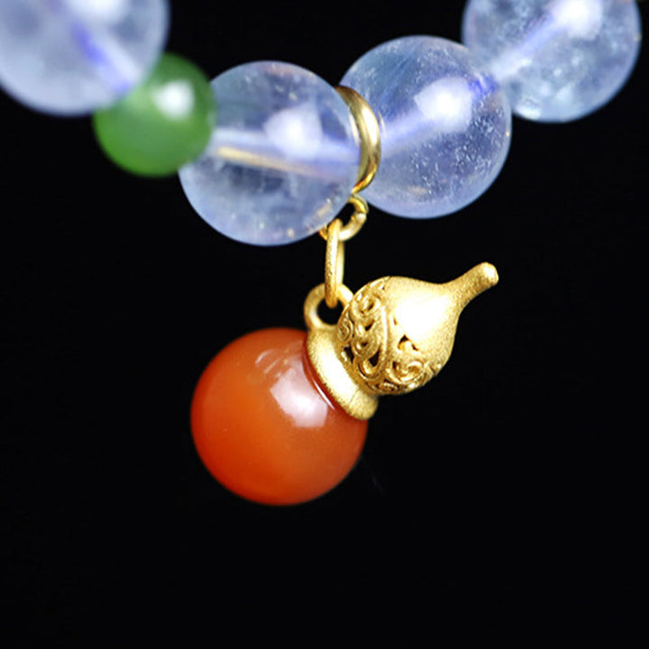 Armband Aquamarin Roter Achat mit goldenem Vogel Anhänger Perlen