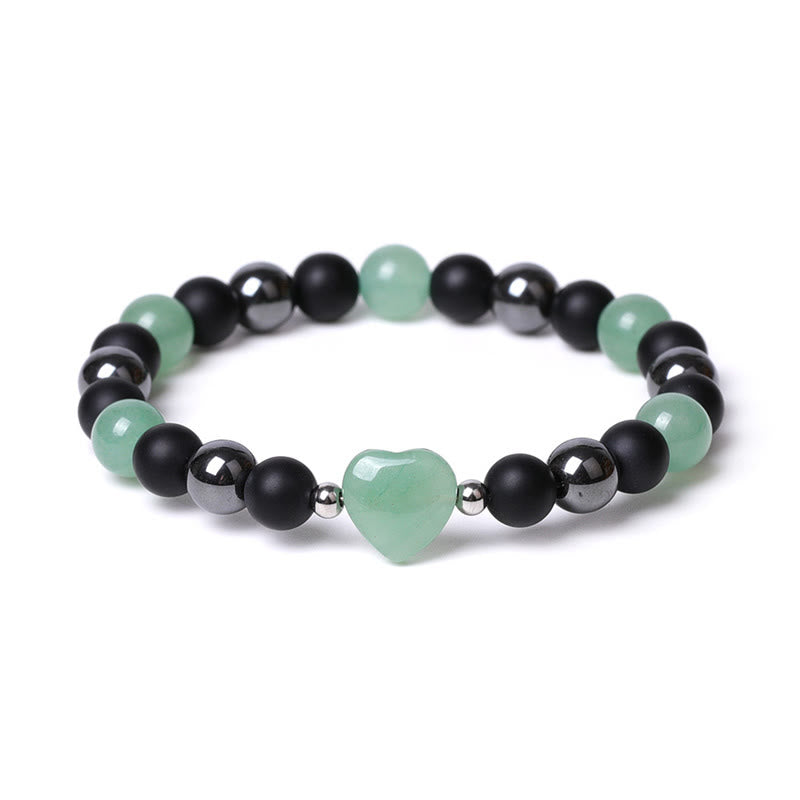 Armband mit schwarzem Onyx, grünem Aventurin und Herzanhänger elegant.