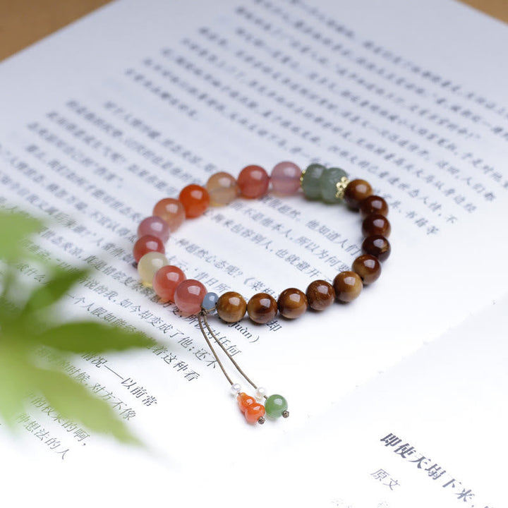 Armband Achat Jade Schutz Wohlstand Naturstein elastisch mehrfarbig