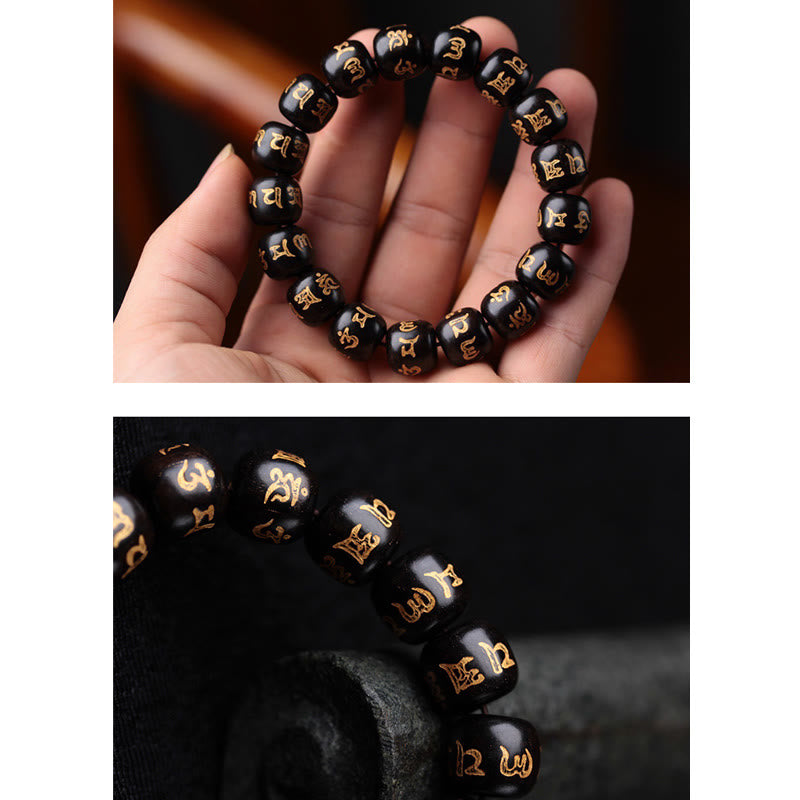 Ebenholz Armband Om Mani Padme Hum schwarze Perlen goldene Gravur elastisch