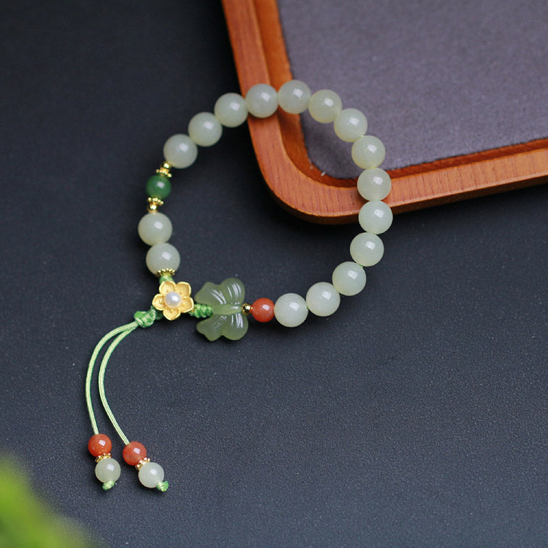 Jade Armband mit Schmetterling Charm grüne Perlen elastisch Glück