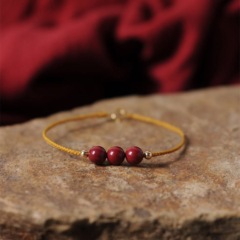 Armband Zinnober – Segen & Segen mit roten Perlen Goldkette elegant