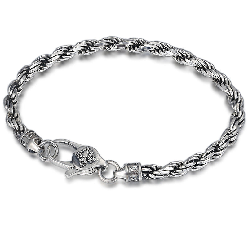Silbernes Seilarmband mit Om Mani Padme Hum Verschluss elegant präsentiert.