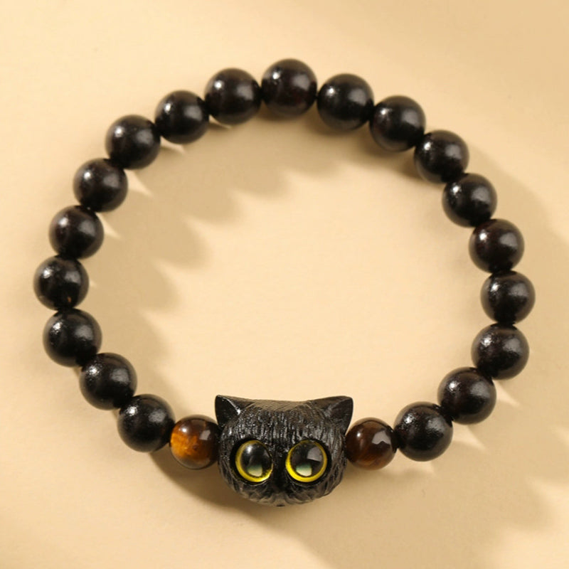 Armband Ebenholz Katze mit gelben Augen Naturstein schwarze Perlen