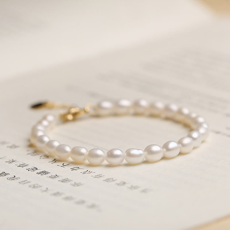 Elegantes Armband Kristall Perle weiß glänzend mit goldenem Verschluss