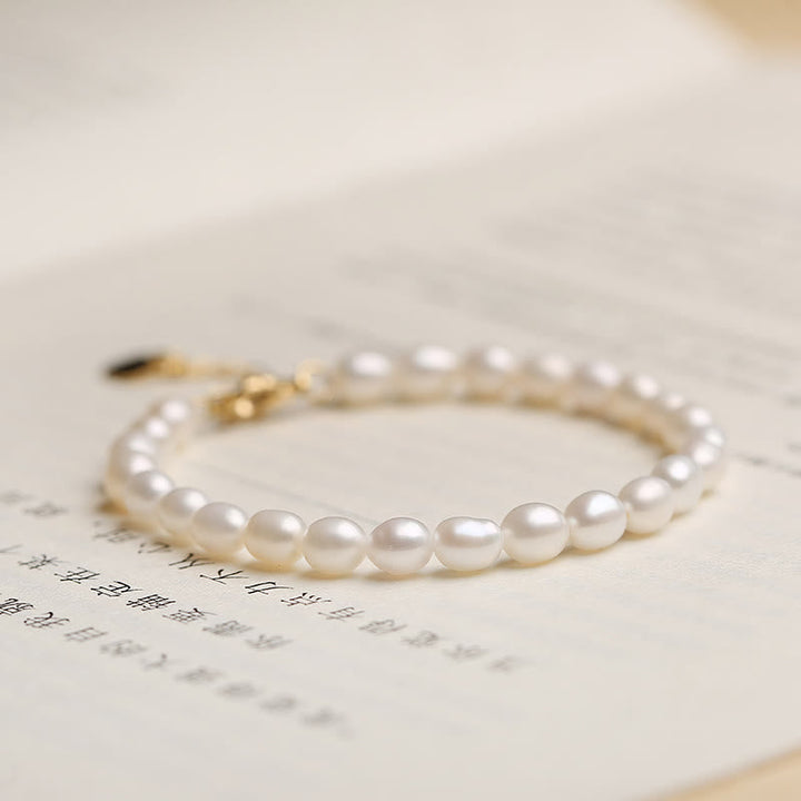 Elegantes Armband Kristall Perle weiß glänzend mit goldenem Verschluss