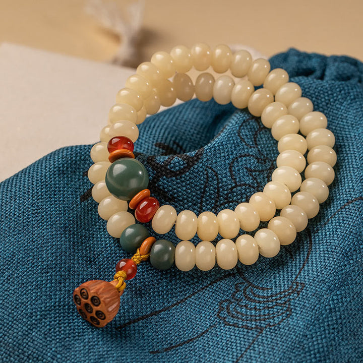 Bodhi Lotus Armband mit Perlen und grünem Stein elegantes Design.