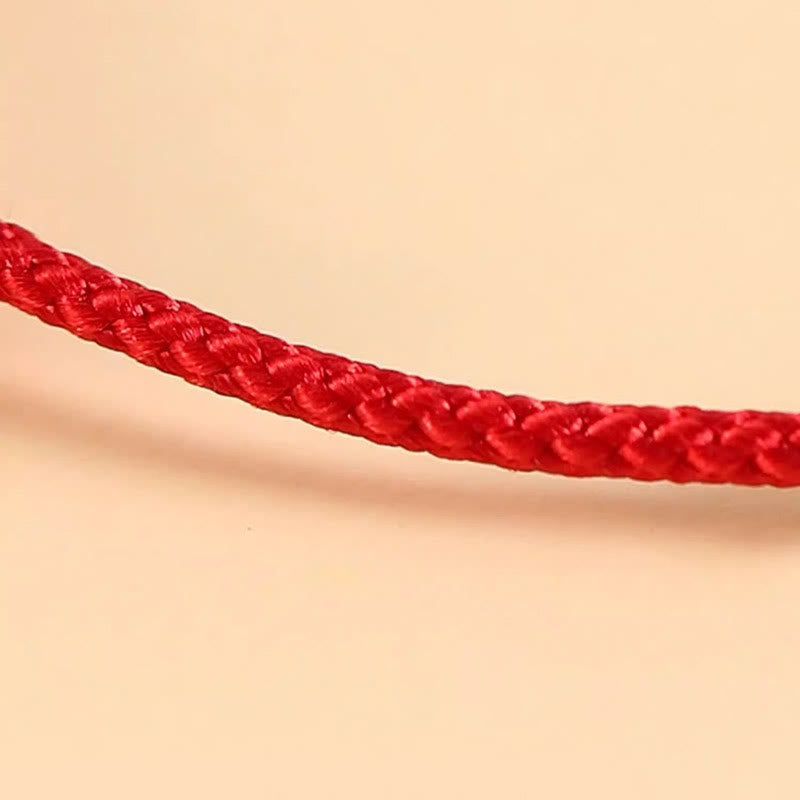 Rotes geflochtenes Armband elastisch Glück Harmonie Tierkreis Symbol
