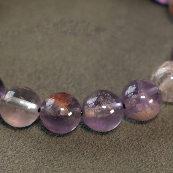 Amethyst Kristall Perlen Armband lila Naturstein glänzend poliert