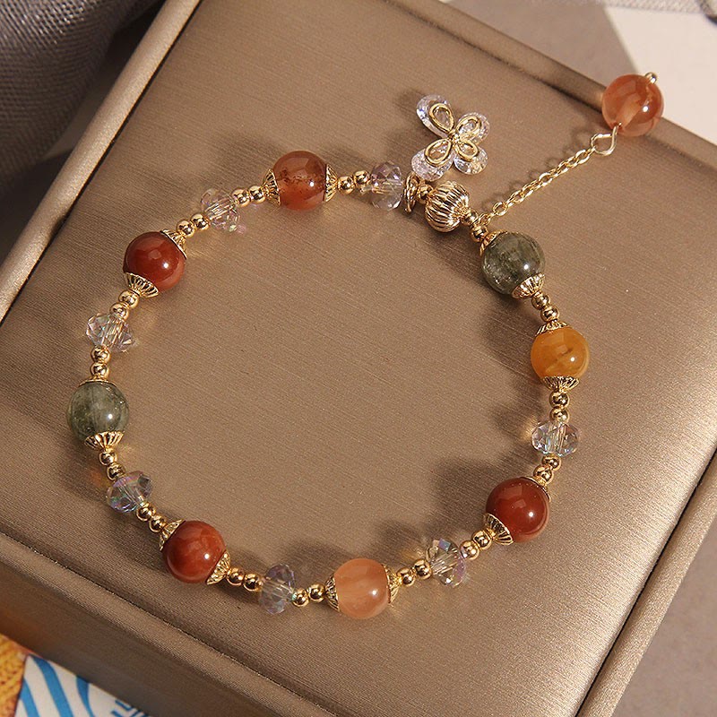 Armband Kristall Schmetterling mit roten Steinen und Schmetterlingsverzierung elegant.