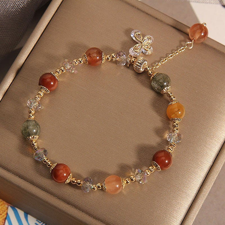 Armband Kristall Schmetterling mit roten Steinen und Schmetterlingsverzierung elegant.