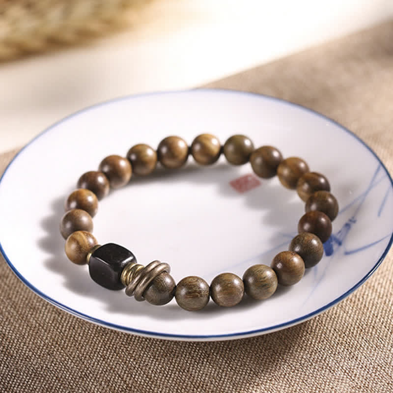 Armband Sandelholz Kristall mit schwarzem Stein Perlen elastisch.