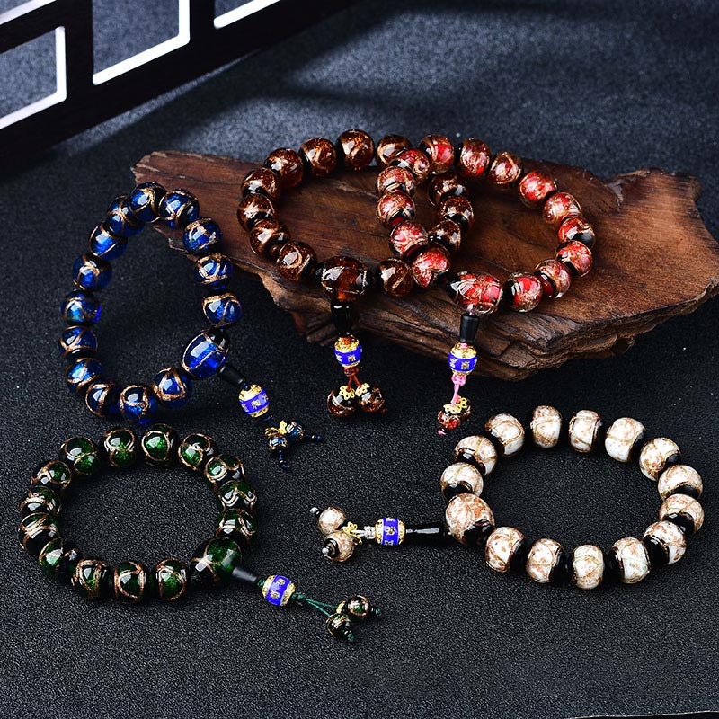 Achat Drachen Armband in Blau, Rot, Grün und Beige Natursteinen.