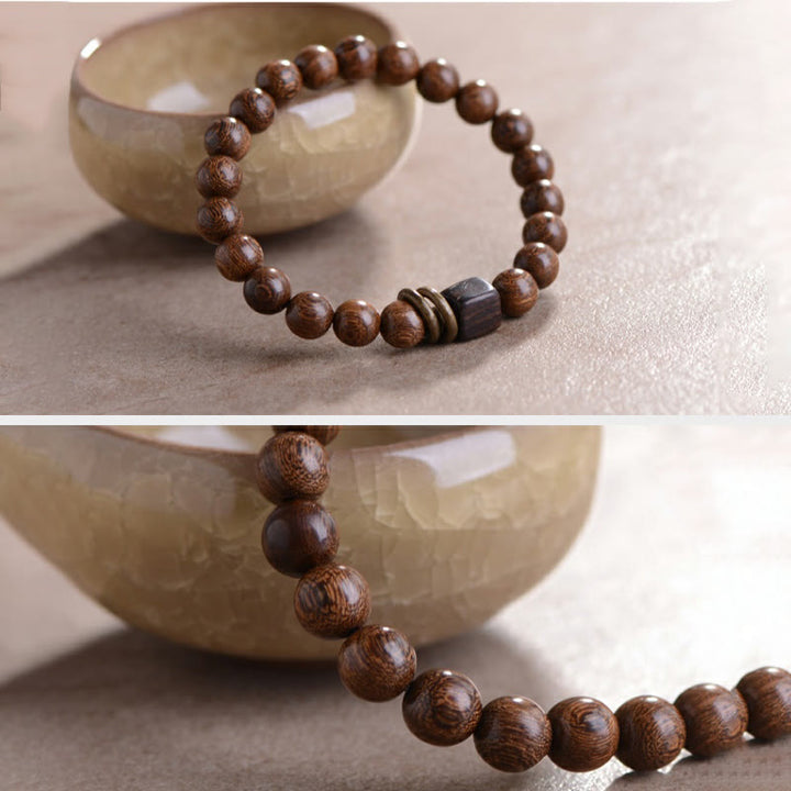 Armband Phoebe Zhennan Holz braun Perlen Spirituality natürlich elegant