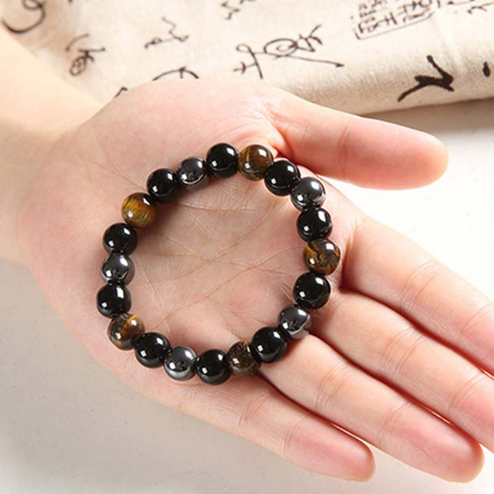 Armband Tigerauge Obsidian Perlen Naturstein schwarzbraun glänzend