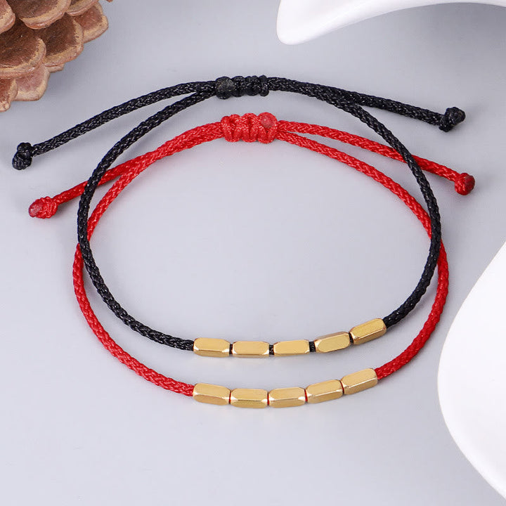 Armband Kupfer – Schutz rote schwarze Schnur goldene Perlen elastisch