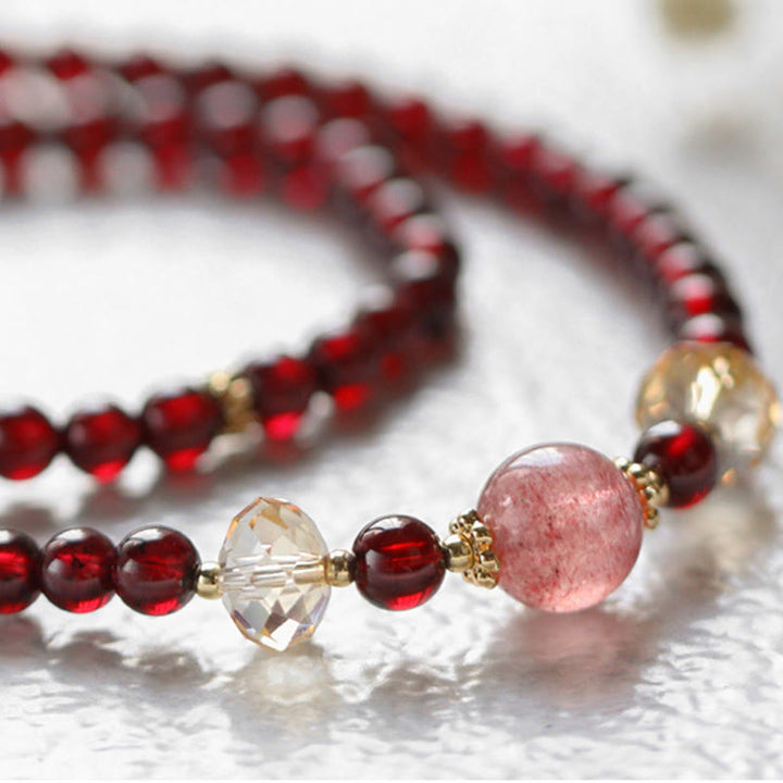 Armband Erdbeerquarz Granat rote Perlen Kristall elegant glänzend