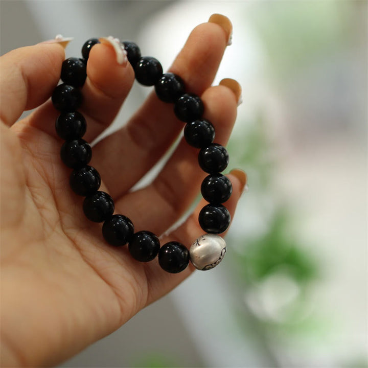Schwarzes Onyx Armband 925 Silber Schutz am Handgelenk getragen
