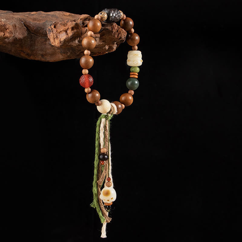 Bodhi-Armband mit Holzperlen, Stein und grüner Quaste Schmuck.