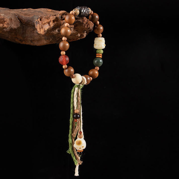 Bodhi-Armband mit Holzperlen, Stein und grüner Quaste Schmuck.