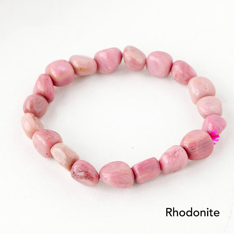 Rhodonit Armband Kristall rosa Naturstein elastisch Perlenarmband getragen