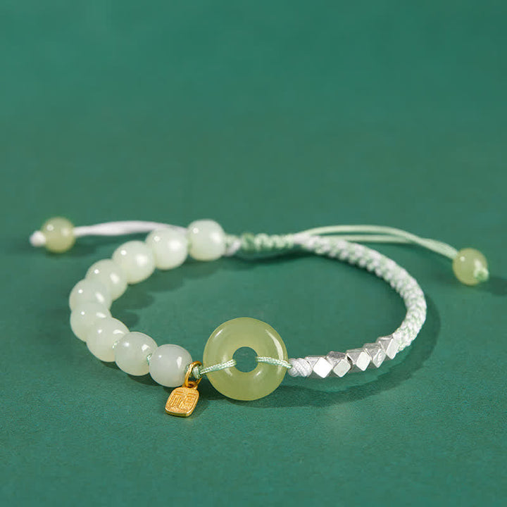 Jade Armband 925 Silber grüne Perlen weißes Geflecht elegant.